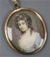 A 19th century Continental oil on ivory miniature of a lady with flower in her hair 4.5 x 4cm, gold framed                             