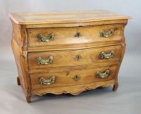 A 19th century Continental walnut serpentine commode, W.3ft 10in. D.2ft 1in. H.2ft 8in.                                                