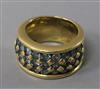 An 18ct gold and blue topaz? pave set ring, size L.                                                                                    