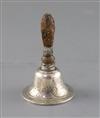 A 19th century continental silver hand bell, H.9.7cm.                                                                                  