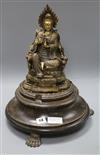 A Buddha and an associated wooden base on claw feet height excl. stand 28.5cm                                                          