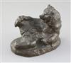 A Russian bronze figure of a reclining bear scratching its foot, 5in.                                                                  