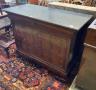 A 19th century continental flamed mahogany commode with black polished marble top, width 126cm, depth 58cm, height 95cm                                                                                                     