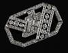 A 1950's/1960's Art Deco style platinum? and diamond set openwork brooch, 57mm.                                                        