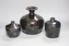 Three Chinese Shanxi black glazed jars, Qing dynasty, height 12 - 20cm                                                                                                                                                      