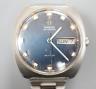 A gentleman's 1960's? stainless steel Omega De Ville automatic day date wrist watch, on associated steel bracelet, case diameter 36mm, no box or papers (dial a.f.).                                                        