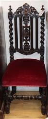 A pair of 19th century Flemish carved oak dining chairs                                                                                