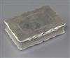 A Victorian engraved silver table snuff box by Nathaniel Mills, of shaped rectangular form, Birmingham 1851, 8.5cm.                    