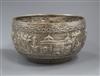 An Indian white metal bowl embossed with figures, 19cm.                                                                                