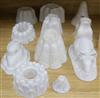 Eleven porcelain jelly moulds                                                                                                          