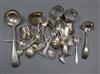 A small group of silver/white metal comprising four spoons, two ladles, four serviette rings, Dutch spoons and a plated napkin ring    