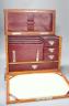 An Edwardian Morocco leather lined oak stationery box and letter rack 36cm                                                                                                                                                  