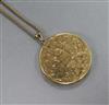 An engraved 9ct gold locket on a 9ct gold chain, locket 43mm.                                                                          