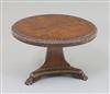 A George IV rosewood banded mahogany miniature breakfast table, diameter 10in.                                                         