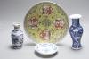 Two Chinese blue and white vases and a dish, together with a famille rose dish, tallest 28cm                                                                                                                                