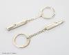 Two boxed modern silver Master of Craftmanship sterling 915 whistle key chains.                                                                                                                                             