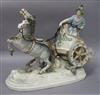 An Italian porcelain group of a figure, chariot and horses, height 34cm (a.f.)                                                         