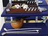 A pipe rack with clay pipes and novelty tobacco jar shaped as a pipe                                                                   