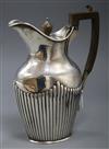 A Victorian demi fluted silver hotwater pot by Waler & John Barnard, London, 1871, 12.5 oz.                                            