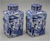 A pair of Dutch delft blue and white lidded tea caddies                                                                                