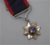 An Indian Order of Merit in silver, stamped verso 2nd Class Order of Merit, fixing nut missing with chips                              