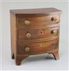 A Regency mahogany miniature bowfront chest, 7.25in., height 7.5in.                                                                    