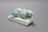 A Herend green ’fishnet’ model of a leopard crouching on a rock, signed Markup B                                                                                                                                            