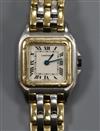 A lady's Cartier Panthere steel and gold quartz wrist watch, with Cartier pouch.                                                       