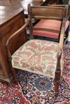 A pair of Regency mahogany open armchairs                                                                                              