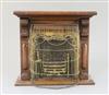 A late Victorian mahogany miniature fireplace, 11.5in. height 10.75in., with associated wirework fire guard                            