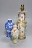 A Chinese famille rose converted lamp, a similar blue and white vase and another vase and cover, overall height 32cm                                                                                                        