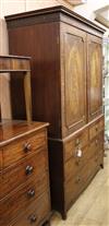 A George III inlaid mahogany linen press W.132cm                                                                                       