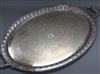 A late Victorian plated engraved two handled tea tray length 73cm                                                                      