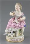 A Meissen figure of a girl seated on a chair, late 19th century, after Acier, height 13.7cm                                            