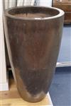 A tall gold glazed garden planter H.90cm                                                                                               