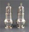 A good pair of early George II silver casters, by Thomas Bamford, 12 oz.                                                               