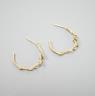 A pair of 18ct gold and three stone diamond set rustic hoop earrings, no butterflies, 25mm, gross weight 3.5 grams.                                                                                                         