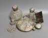 Sundry small silverware, consisting of a hand mirror, four silver topped toilet bottles, a plated card case, pocket watch, etc                                                                                              
