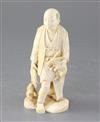 A Japanese ivory okimono of a farmer and two rabbits, early 20th century, height 16.5cm, repairs                                       