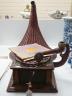 An early 20th century "Favourite" wind up gramophone, together with a bronzed metal horn                                                                                                                                    