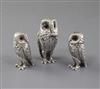 A 1960's silver three piece condiment set modelled as owls, by William Comyns & Sons Ltd, mustard 75mm.                                