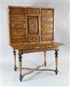 A Louis XIV inlaid walnut cabinet on stand, W.3ft 11in. D.2ft 9in. H.5ft 5in.                                                          