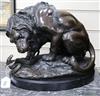 After Barye. A bronze lion and snake, signed height 34cm                                                                               