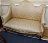 An Edwardian camel-back settee W.140cm                                                                                                 