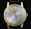 A gentleman's early 1960's 18ct gold Longines automatic wrist watch,                                                                   