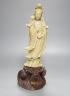 A soapstone Guanyin on base, 40cm                                                                                                                                                                                           