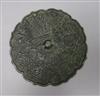 A 19th century bronze copy of a Ming dynasty hand mirror                                                                               