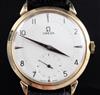 A gentleman's 1940's 18ct gold Omega manual wind wrist watch,                                                                          