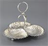 A late Victorian silver trefoil shaped hors d'oeuvres dish by Josiah Williams & Co, 27.5 oz.                                           