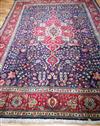 A Tabriz blue ground carpet 340 x 253cm                                                                                                